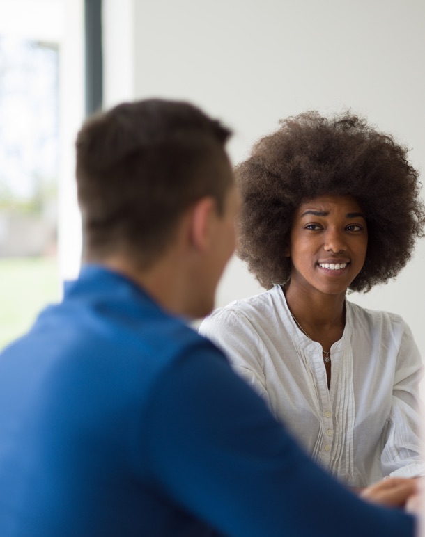Two people sitting down