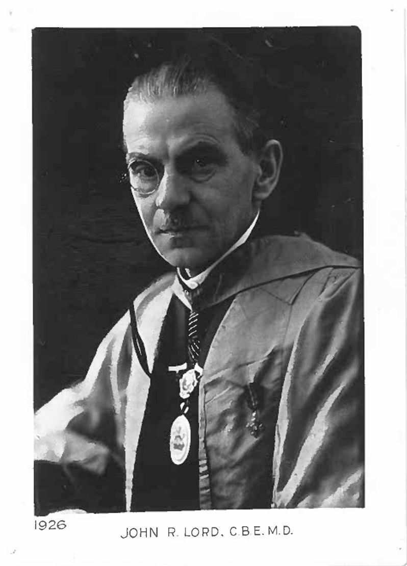 Black and white photograph of a middle aged white man wearing robes and the RCPsych chain of office.