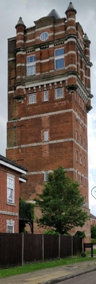 Red brick tower of at least 5 storeys
