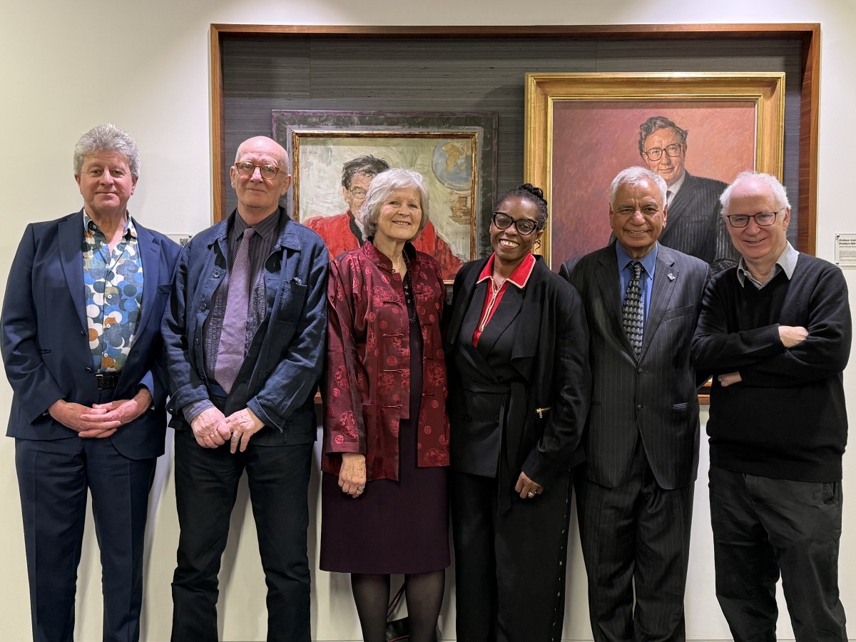 Six RCPsych Presidents (Adrian James, Mike Shooter, Sheila Hollins, Lade Smith, Dinesh Bhugra) standing in front of portraits of other former Presidents